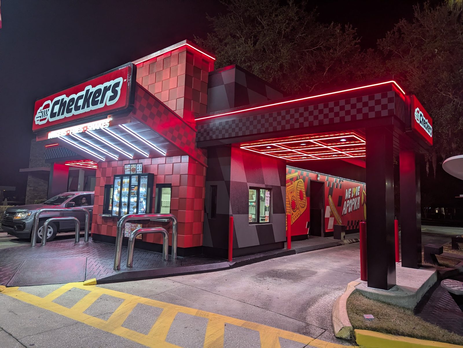 The same store after a full Imagine décor remodel, lit up at night